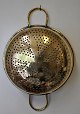 Brass colander, 
19th century 
Denmark. With 
two handles. 
Diameter: 26.5 
cm. H: 11 cm. 
Length with ...