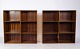 The light mahogany bookcase, designed by Mogens Koch and manufactured by Rud Rasmussen in the ...