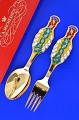 Anton Michelsen Christmas cutlery,  gilded sterling silver with enamel motif.  Christmas fork ...