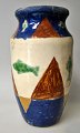 Danish ceramist (20th century): Vase in red clay. Polychrome decorated. Decorated with fish and ...