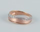 Danish goldsmith, 8 karat gold ring adorned with three diamonds. Art Deco design.From the ...