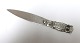 Silver letter knife (830). Owl with green eyes. Length 11.5 cm. Produced 1925.