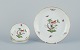 Herend, 
Hungary. Set of 
four porcelain 
bowls 
hand-painted 
with 
butterflies and 
birds on ...