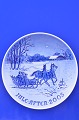 Bing & Grondahl porcelain. Christmas plate 2005, "Bringing home the Christmas tree". Artist : ...