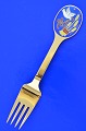 A. Michelsen 
Christmas spoon 
 gilded 
sterling silver 
with enamel 
motif Christmas 
fork from year 
...
