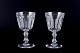 Val St. Lambert, Belgium, two "Lalaing" red wine glasses in clear faceted cut crystal ...