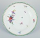 Meissen, 
Germany, 
porcelain plate 
hand-painted 
with floral 
motifs and 
insects.
Late 19th ...