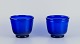 A pair of 
Danish art 
glass vases in 
dark blue 
glass. Mouth 
blown.
1930/40s.
Perfect ...