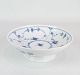The bowl on foot from Royal Copenhagen's Musselmalet Riflet series with number 1/18 is a refined ...