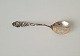 Marmalade spoon 
in silver 
decorated with 
rose 
Stamp: AMD - 
800 
Length 12 cm.