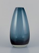 Tamara Aladin (1932-2019) for Riihimäen Lasi, Finland. Art glass vase in petroleum blue.Model ...