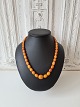 Long Vintage necklace with polished oval amber pearls. Length 58 cm. The largest pearl ...