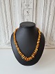 Long vintage necklace with polished amber pieces Length 64 cm. The amber pieces is in size ...