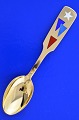 Anton Michelsen 
Christmas 
cutlery, gilded 
sterlingsilver 
with an inlaid 
enamel motif.  
Christmas ...