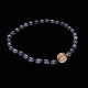 Ole Lynggaard. 
Tahiti Pearl 
Necklace with 
14k Gold Gold 
Ball Clasp.
Tahiti-Pearl 
Necklace.
14k ...
