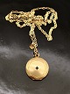Gilded medallion D. 2.5 cm cm. and chain 58 cm. subject no. 552858