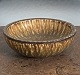 Gunner Nylund 
stoneware bowl 
made by 
Rörstrand. Ø17 
cm. H. 6 cm. 
Stamped with 
Rörstrand 
monogram ...