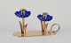 Gunnar Ander for Ystad Metall, Sweden. Candlestick holder in brass and blue art glass shaped ...