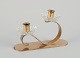 Gunnar Ander for Ystad Metall, Sweden. Candlestick holder in brass and clear art glass shaped ...