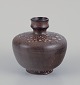 European studio 
ceramicist. 
Unique ceramic 
vase. Glaze in 
brown tones.
Ca. 1980s.
Stamped ...