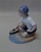Royal 
Copenhagen 1878 
RC Boy with 
sailing boat . 
14 x 12 cm 
Design Peter 
Herold 1917 In 
mint and ...
