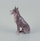 Bing & 
Grøndahl, 
porcelain 
figurine of a 
standing German 
Shepherd.
Model number 
1765.
Designed ...