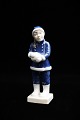 Royal 
Copenhagen 
porcelain 
figurine of a 
girl with a 
snowball. 
Decoration 
number: 5656. 
...