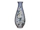 Royal 
Copenhagen vase 
with blue and 
white flowers.
Please note 
that this item 
is exclusively 
...