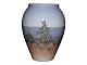 Royal 
Copenhagen 
smaller vase 
with landscape.
The factory 
mark tells, 
that this was 
produced ...