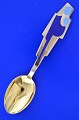 Anton Michelsen 
christmas 
cutlery, gilded 
sterlingsilver 
with an inlaid 
enamel motif. 
Christmas ...
