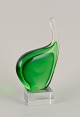 Per Lütken for 
Holmegaard. 
Sculpture in 
green art 
glass. On a 
base.
Organic ...