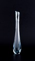 Nils Landberg 
for Orrefors, 
Sweden. Tall 
and slender art 
glass vase in 
clear ...