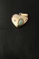 Beautiful and 
unique pendant 
for necklace, 
crafted in 14 
carat gold with 
opal and 
brilliant. The 
...