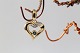 Heart-shaped pendant in 14 carat gold, with diamonds and ...