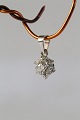 Star-shaped pendant in 14 carat white gold, with ...
