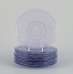 Lalique-style. 
A set of ten 
glass plates 
designed with 
flower motifs 
in purple ...