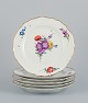 Meissen, 
Germany. A set 
of six antique 
porcelain 
dinner plates. 
Hand-painted 
with polychrome 
...