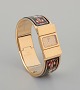 Hermes, ladies' wristwatch. Made of gilded metal and enamel work.Model: "Loquet" L01. ...