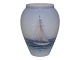 Royal 
Copenhagen 
small vase with 
sailboat.
The factory 
mark tells, 
that this was 
produced ...