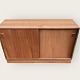 Sideboard / cabinet in teak veneer with sliding doors and removable plinth. Slight color ...