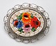 Millefiori 
micro mosaic 
brooch. 20th 
century Italy. 
With metal 
mounting. 
Unstamped. L: 
4.7 cm.