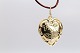 Beautiful gold 
heart in 14 
carat gold, 
which can be 
used as a 
pendant for a 
necklace. The 
gold ...
