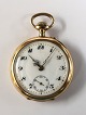 Women's gold pocket watch (585). Diameter 34 mm. Clockwork works. There is a hairline in the dial.