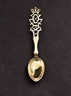 A Michelsen 
commemorative 
spoon King 
Christian X's 
70th birthday 
1940 gilded 
silver subject 
no. ...