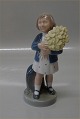 Royal 
Copenhagen One 
of 12 month 
figurines 4527 
RC May - girl 
with flowers 
Design Hans 
Henrik ...