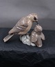 B&G Denmark figurine No 1869, Sparrow feeding 
young.
