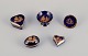Limoges, 
France. Five 
pieces of 
miniature 
porcelain 
decorated with 
22-karat gold 
leaf and ...