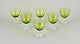 Val St. 
Lambert, 
Belgium. A set 
of six white 
wine glasses in 
green and clear 
mouth-blown 
crystal ...