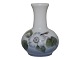 Royal 
Copenhagen 
miniature vase.
Decoration 
number 
863/1252.
Factory first.
Height 6.0 ...