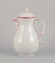 Meissen, 
Germany. Large 
coffee pot 
decorated with 
coral red and 
gold-colored 
trim. Art ...